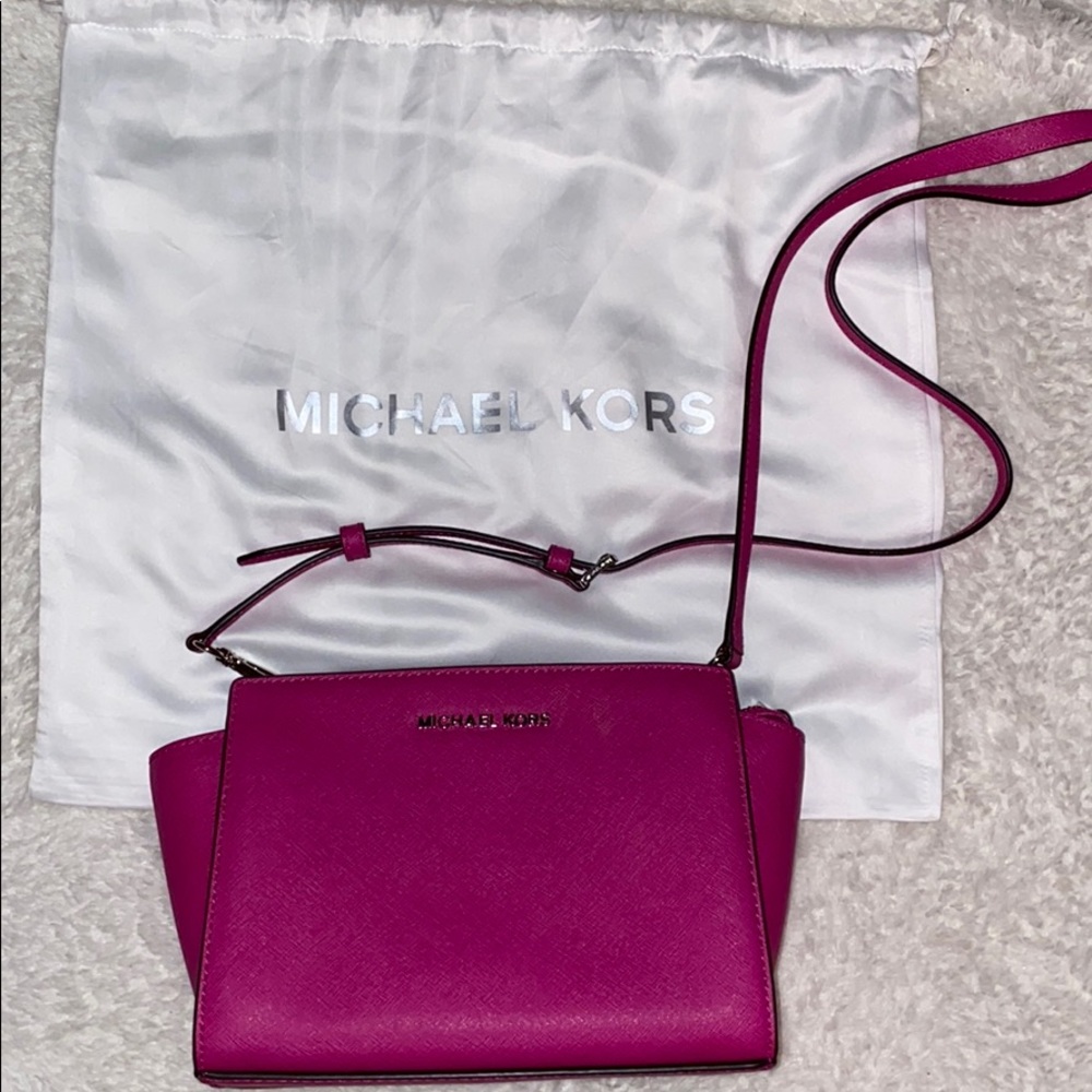 Small pink Michael Kors crossbody satchel bag
